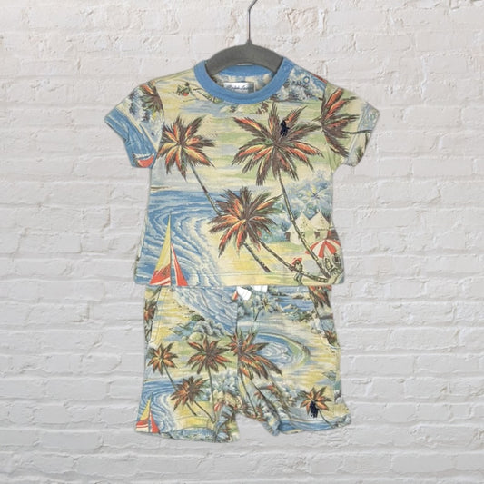 Multicoloured short-sleeve shirt and shorts set with tropical palm tree and sailboat print.