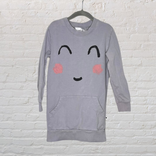 Light grey long sweatshirt dress with a cute smiley face design and front pocket, hanging on a hanger.