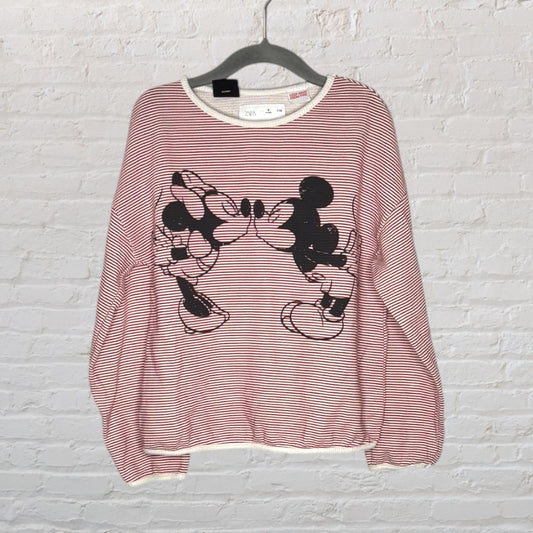 Red and white striped sweatshirt featuring a graphic of Mickey and Minnie Mouse facing each other.