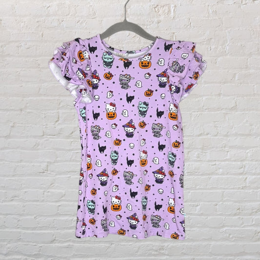 Lavender dress with Hello Kitty and Halloween-themed print, featuring ruffle sleeves, hung on a hanger.