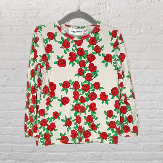 Ivory long sleeve top with a vibrant red rose and green leaf pattern, made by Mini Rodini.