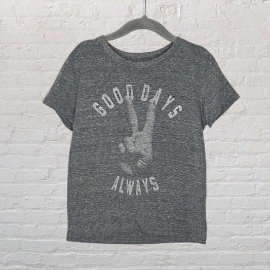 Heather gray T-shirt with 'Good Days Always' and peace sign graphic, hanging on a hanger.