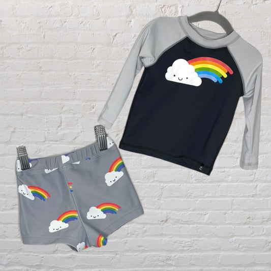 Two-piece rash guard swim set featuring a black and grey top with a rainbow cloud print and matching grey shorts with similar pattern.