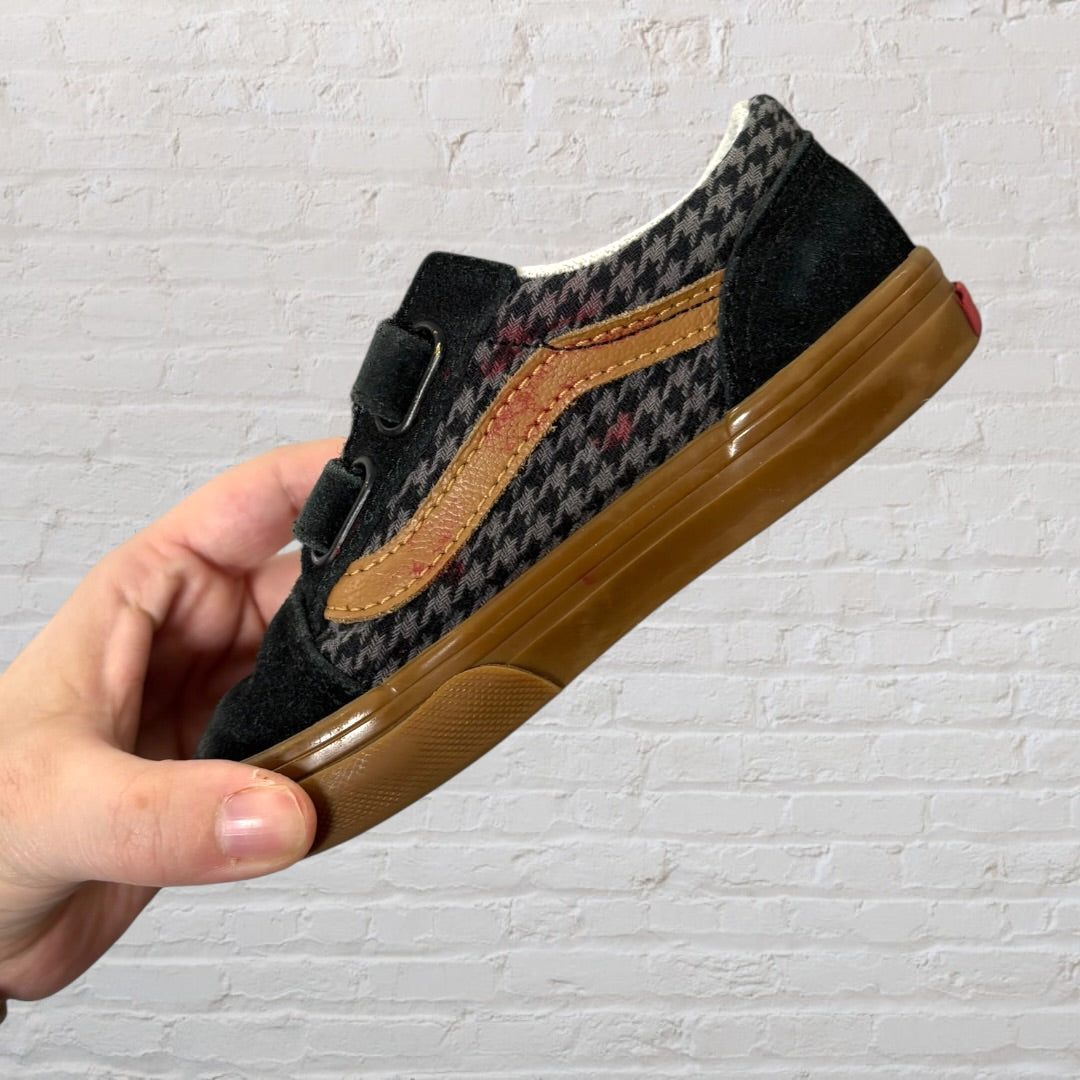 Checkered sneakers with velcro straps, featuring black and brown accents and a gum sole.