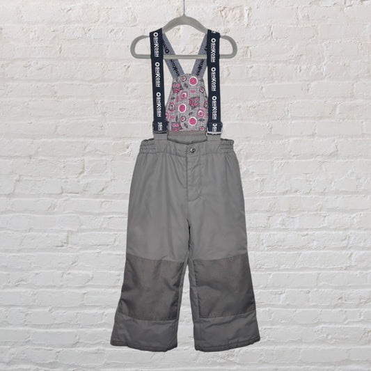 Gray OshKosh B'gosh kids' snow pants with adjustable suspenders, featuring a fun printed bib.