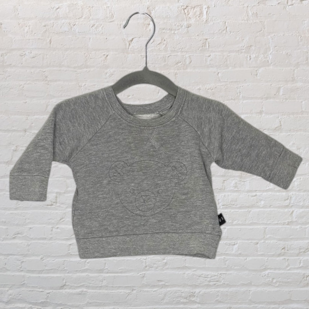 Grey sweatshirt for kids with an embroidered bear design on the front, displayed on a hanger.