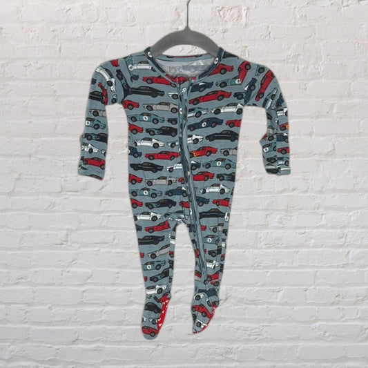 Grey baby onesie with a car pattern in red, black, and white, featuring a front zipper, hanging on a hanger.
