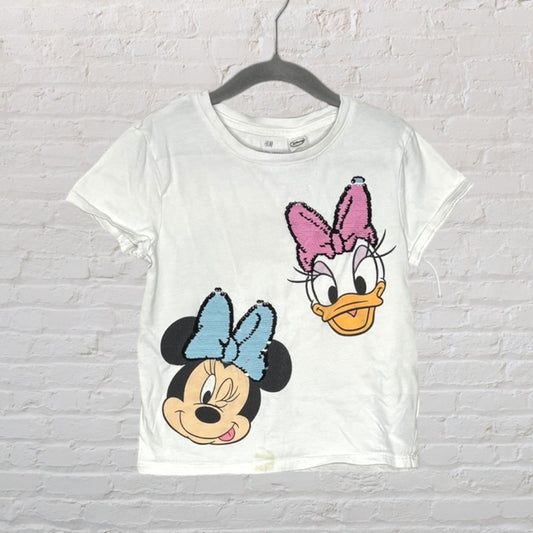 White T-shirt featuring Minnie Mouse and Daisy Duck with bows, made by H&M.