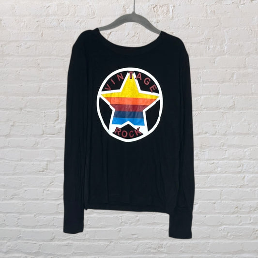 Black long sleeve shirt with a Vintage Rock graphic featuring a star with rainbow stripes.