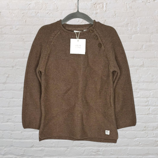Brown knit sweater with button details on the shoulder and a 'Join Life' tag, hanging on a hanger.
