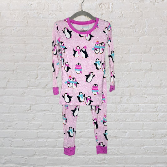 Pink pajama set with multicolored penguin prints, long sleeves and pants, displayed on a hanger.