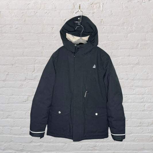 Black insulated winter jacket with a hood, front pockets, and zip closure, hanging on a hanger.
