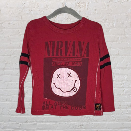Red long-sleeve Nirvana concert T-shirt featuring black stripes on sleeves and distressed graphics of a smiley face and concert details.