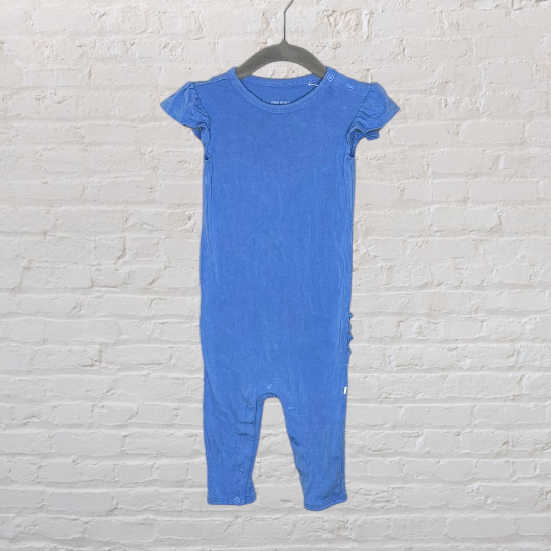 Blue romper with ruffle details on the back, short sleeves, and snap closures.
