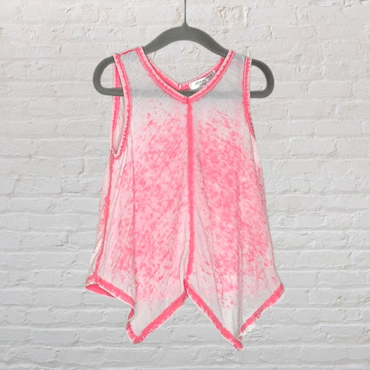 Pink and white tie-dye sleeveless top by Joah Brown with a unique hemline, hanging on a black hanger.