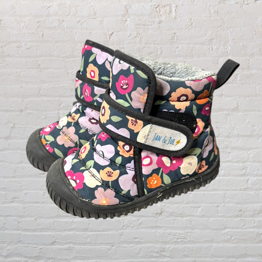 Jan & Jul children's winter boots with multicolored floral design and rubber soles.