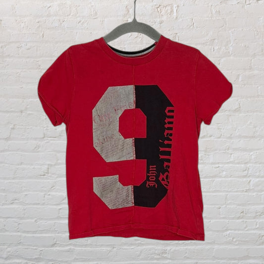 Red T-shirt with a large number 9 graphic in black and grey, featuring vertical text.
