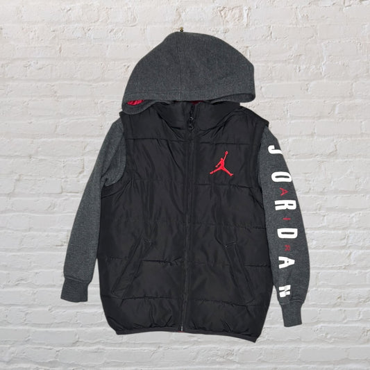 Jordan black and grey hooded vest with long sleeves, featuring the red Jumpman logo and 'Jordan' text down the sleeve.