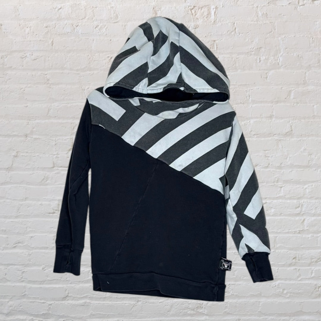 Unisex hoodie with diagonal black and grey stripes and color block design, featuring a cozy hood.