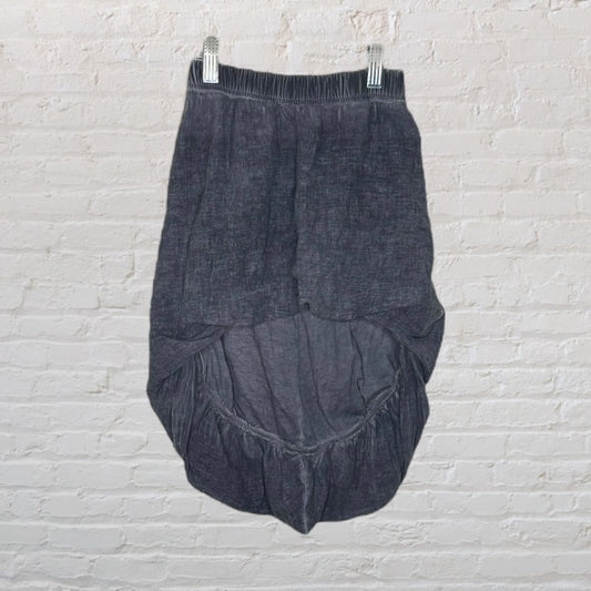 Dark gray asymmetric hem skirt with an elastic waistband, displayed on a hanger.